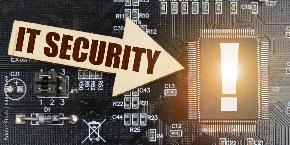 Poster On the computer board, a microcircuit with an exclamation mark and an arrow with the inscription - IT SECURITY