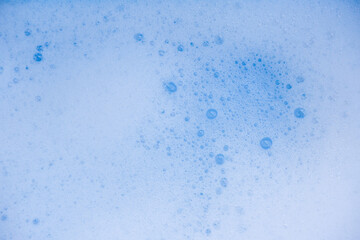 Abstract background white soapy foam texture. Shampoo foam with bubbles
