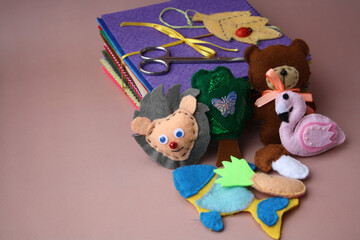Children's toy made of felt. Various figures made of fabric. Creativity with children. DIY projects with your own hands. Craft.