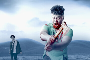 Scary zombie with blood and wound on his body holding ax standing