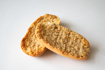 Cardamom rusks on white background