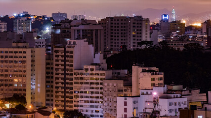 Naklejka premium Niterói, Rio de Janeiro, Brazil - CIRCA 2021: Long exposure urban night photography with buildings and lights of a Brazilian city
