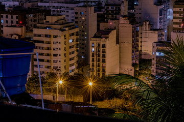 Fototapeta na wymiar Niterói, Rio de Janeiro, Brazil - CIRCA 2021: Long exposure urban night photography with buildings and lights of a Brazilian city