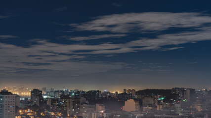 Naklejka premium Niterói, Rio de Janeiro, Brazil - CIRCA 2021: Long exposure urban night photography with buildings and lights of a Brazilian city