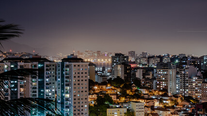 Obraz premium Niterói, Rio de Janeiro, Brazil - CIRCA 2021: Long exposure urban night photography with buildings and lights of a Brazilian city