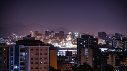 Fototapeta premium Niterói, Rio de Janeiro, Brazil - CIRCA 2021: Long exposure urban night photography with buildings and lights of a Brazilian city