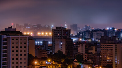 Obraz premium Niterói, Rio de Janeiro, Brazil - CIRCA 2021: Long exposure urban night photography with buildings and lights of a Brazilian city