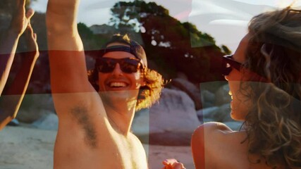 Animation of waving flag of england over group of friends having fun on the beach - Powered by Adobe