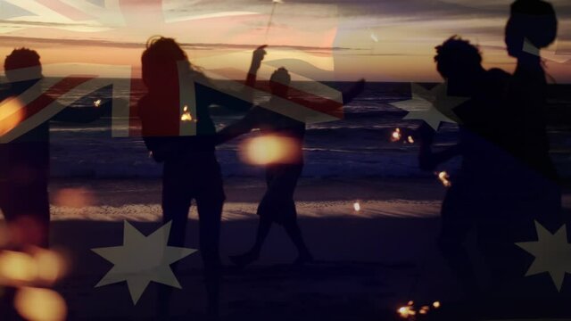 Animation of waving flag of australia over group of friends having fun on the beach