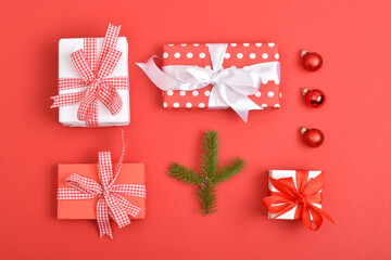 Christmas layout background with gifts on a red background. Happy New Year 2022.