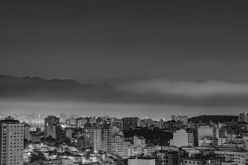 Fototapeta premium Niterói, Rio de Janeiro, Brazil - CIRCA 2021: Long exposure urban night photography with buildings and lights of a Brazilian city