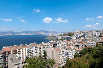 Izmir cityscape, aerial view of the city of Izmir with buildings and sea. Izmir is the third biggest city in Turkey.