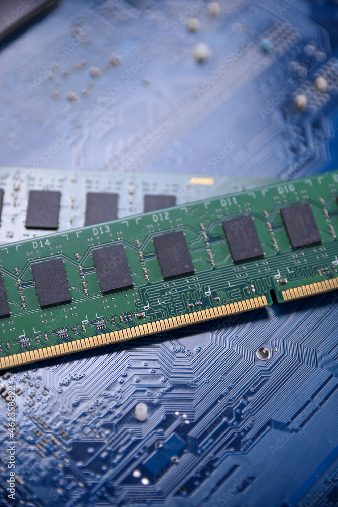 Poster Computer memory RAM on motherboard background . Close up. system, main memory, random access memory, onboard, computer detail. Computer components . DDR3. DDR4. DDR5