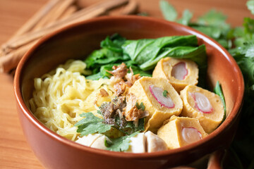 Egg noodles with pork meatballs and vegetables Noodles Thai style