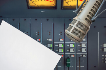 Professional microphone and sound mixer in radio station studio