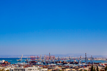 cloudless sky over the seaport in haifa on a sunny day