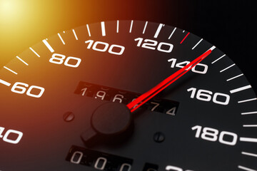 Car speedometer. Auto car speedometer shows 140 km h or miles.Closeup shot,dark black...