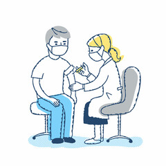 注射をしている女性医師と患者