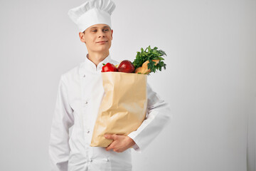 chef with a package of fresh food cooking