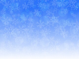 光と雪の結晶の青色の背景
