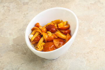 Marinated pickled honey mushrooms in the bowl