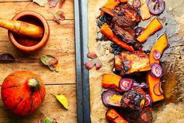 Grilled meat with autumn pumpkin