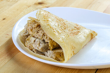 Pancake with chicken and onion