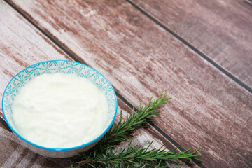 white fermented milk yogurt in a glass bowl