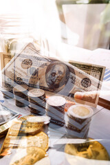 Bitcoin cryptocurrency coin with a gold bullion bar. Investment concept