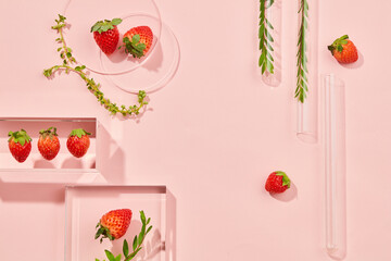 
Glass petri dish and test tube with strawberry extract. Research and develop cosmetic production in the laboratory. empty space for design. Top view image