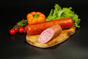 Pork ham sausage cut isolated