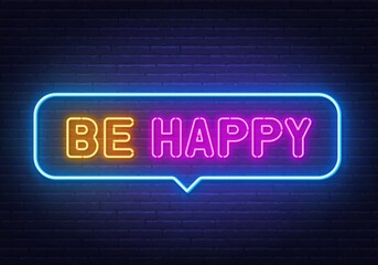Be happy neon sign on brick wall background.