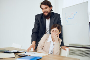 man harassing and woman at work harassment secretary dissatisfaction