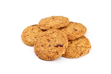 Cereal cookies with red berry fruits on white background