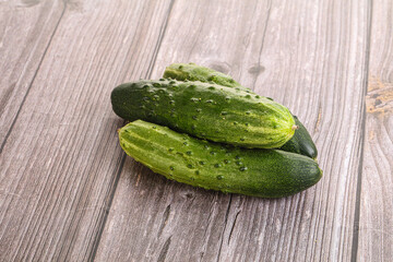 Fersh juicy green cucumbers heap