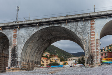 Low angle view of the railway bridge in Zoagli, Liguria, Italy. Cloudy day.