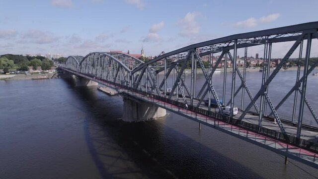 Torun, a Polish city during the day. A sunny and slightly cloudy day in Toruń on the Vistula River.