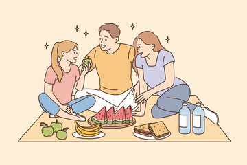 Having picnic and leisure time with family concept. Smiling happy family father mother daughter sitting together eating fruits having picnic vector illustration 