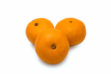 Three tangerines on a white background. Isolate.