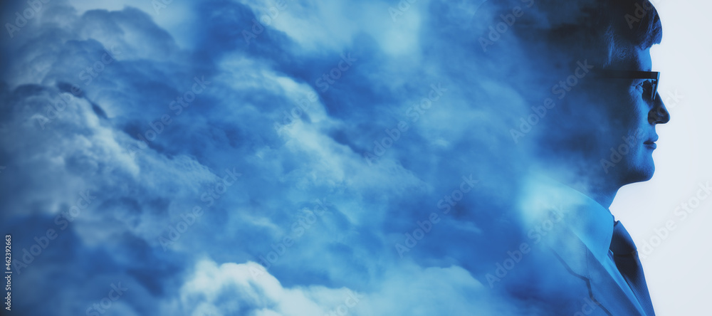 Poster abstract head in clouds concept. man portrait silhouette on white sky background with mock up place.
