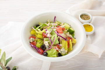 salad with cheese and olives, salad with arugula and feta
