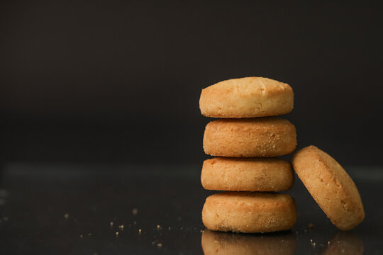 Famous osmania biscuits closeup with selective focus and blur with dark background 