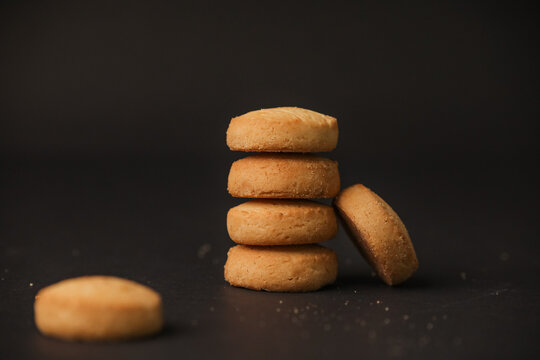 Famous osmania biscuits closeup with selective focus and blur with dark background 