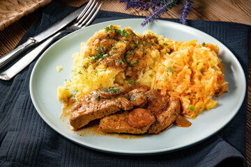 Stewed turkey meat with chorizo sausage.