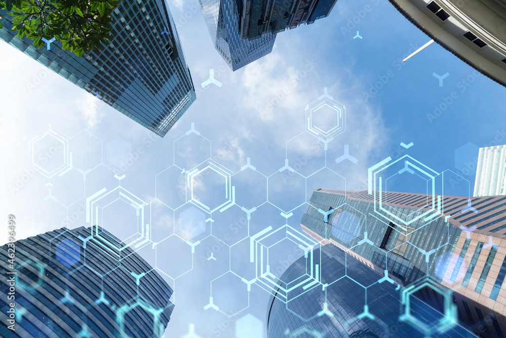Poster technology hologram over low angle shot of singapore skyscrapers. the largest tech hub in southeast 
