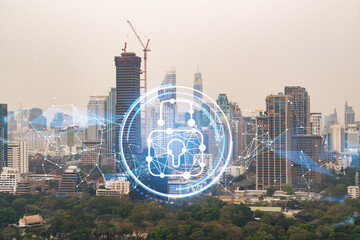 Padlock icon hologram over panorama city view of Bangkok to protect business in Southeast Asia. The...