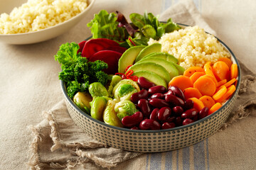 Tasty bowl with couscous and vegetables