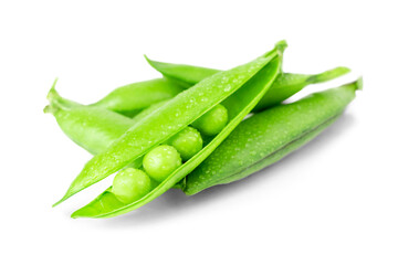 Fresh open pods of green peas beans with water drops on a white background. Pile of sweet legumes isolated. Healthy nutrition and raw organic food ingredients.