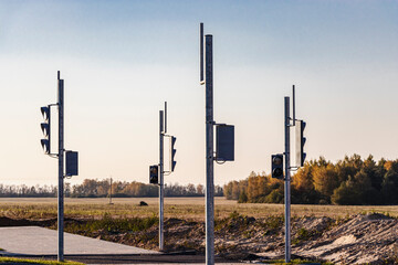 Installation of group traffic lights during the construction of a new traffic intersection and a...