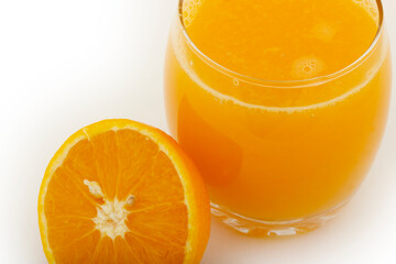 fresh orange juice in glass cup